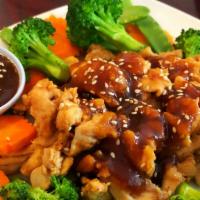 Teriyaki Chicken · Grilled chicken, steamed broccoli, carrots, snow peas, teriyaki sauce and sesame seeds