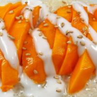 Mango Sticky Rice · Sticky rice with coconut sauce topping with ripe mango