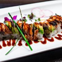 Dragon Roll · Tempura shrimp roll topped with grilled fresh water eel on top, avocado & unagi sauce.
