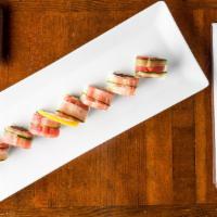 Red Dragon Roll · Spicy tuna roll topped with fresh tuna sashimi and cucumber.