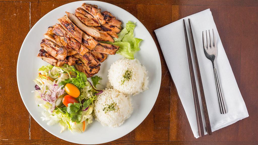 Teriyaki Chicken · Char grilled dark meat. Served with steamed rice and house salad