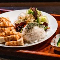 Teriyaki Tofu · Fried soft tofu cubes with teriyaki sauce. Served with rice and house salad