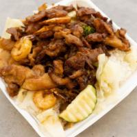 Chicken & Shrimp Teriyaki · Served with steamed rice and mixed vegetables
