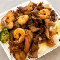 Beef, Chicken & Shrimp Teriyaki · Served with steamed rice and mixed vegetables