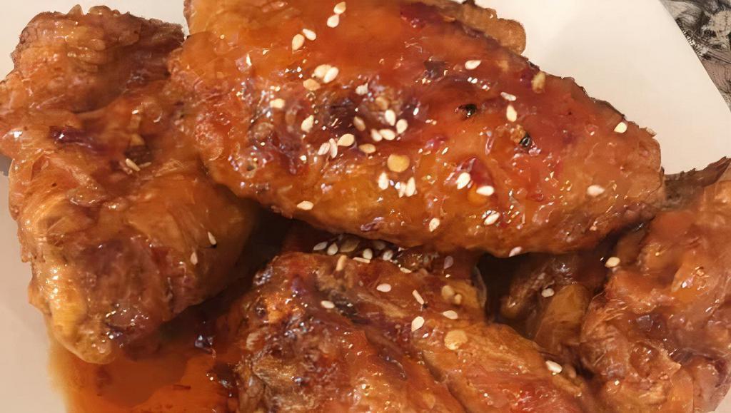Crazy Wings · Battered & Fried wings lathered with a sweet & mildly spicy sauce...Delicious!