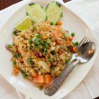 Chang Thai Fried Rice · Choice of meat stir fried with jasmine rice, egg, onions, peas, carrots.