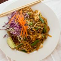 Pad Thai · Thin rice noodles stir fried with egg, green onions, bean sprouts, and mixed with a sweet an...