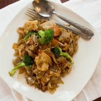 Pad See Ew · Wide rice noodles stir fried with egg, carrots, and broccoli.