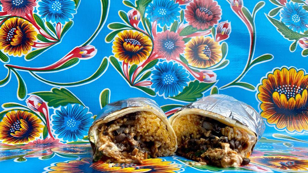Burrito · Fourteen inch flour tortilla filled with Mexican rice, black beans, your choice of meat or veggie mix, cilantro, onions, and sour cream, and a side of salsa.