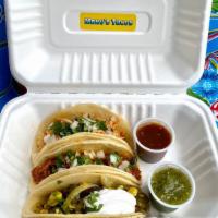 Taco Trio · Three street style tacos with your choice of filling, on double corn tortillas with cilantro...