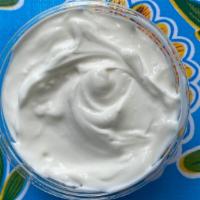 Sour Cream · Mexican crema to top off your tacos.