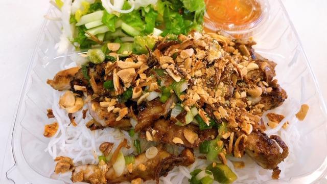 Vermicelli Noodles With Grilled Chicken · served with lettuce, mixed herbs, pickled daikon & carrot, cucumber, bean sprout, topping with onion, fried shallot, PEANUT and side of homemade fish sauce (nước mắm)