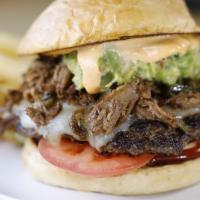Colorado · Shredded lamb, green chiles, grilled onions, pepper jack, guacamole, chipotle mayo, ketchup,...