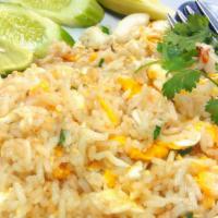 Thai Fried Rice · Stir-fried white rice with egg, onion, carrot, and green onion
