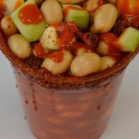Lokohuates/ Krazy Peanuts · Japanese peanuts with chamoy, tajin,  lime,  jicama, cucumber and  sweet and spicy candy.