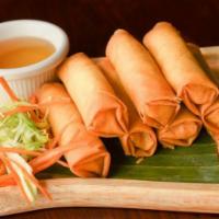 Veggie Spring Rolls · CRISPY FRIED SPRING ROLL FILLED WITH CHOPPED CABBAGE,CARROTS & CORN. SERVED WITH PLUM SAUCE.