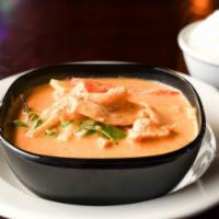 Red Curry · RED CURRY PASTE WITH COCONUT MILK WITH BAMBOO SHOOTS,BELLPEPPERS AND SWEET BASIL.