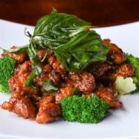 Crispy Garlic Chicken · DEEP FRIED CHICKEN BREAST SAUTEED IN OUR SPECIAL HOMEMADE SAUCE.TOPPED WITH CRISPY BASIL.