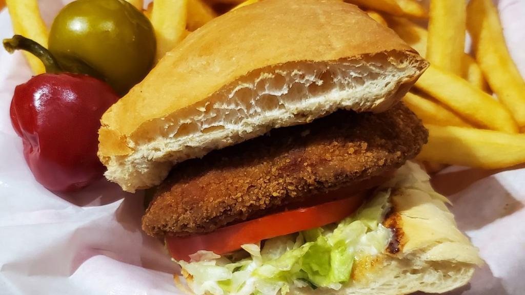 Fried Chicken Sandwich · Italian herb chicken, served on our locally-baked bun with mayo, lettuce and tomato.