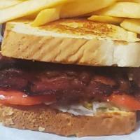 Blt On Toast · Our custom bacon weave served on Texas toast, garnished with mayo, lettuce and fresh sliced ...