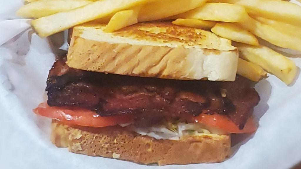 Blt On Toast · Our custom bacon weave served on Texas toast, garnished with mayo, lettuce and fresh sliced tomato.