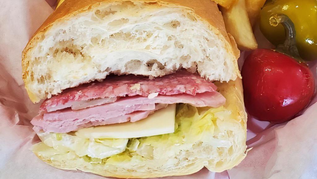 Half Hoagie · Freshly sliced Italian salami, deli-style baked ham, pro and swiss cheeses. Served on a mini loaf with mayo and lettuce. Your choice cold or grilled.