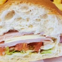 Half Turkey And Swiss · Freshly sliced Turkey served on a mini loaf with mayo, lettuce and tomato. Your choice of Gr...