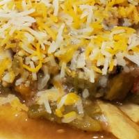 Green Chili Chz Fries · Our premium fry smothered in our house made green chili topped with shredded cheese.