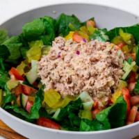 Tuna Salad · Tuna mixed with diced onion, relish & mayo, tomato, cucumbers & pickles on romaine lettuce.