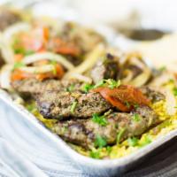 8 Dolmas Vegan Plate · with Sauteed Onions Cabbage and Peppers