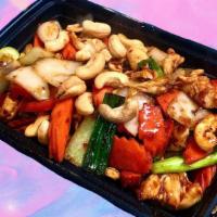 Pad Cashew · Stir-fried choice of meat with chili paste, bell peppers, carrot, cashew nuts, onions, and g...