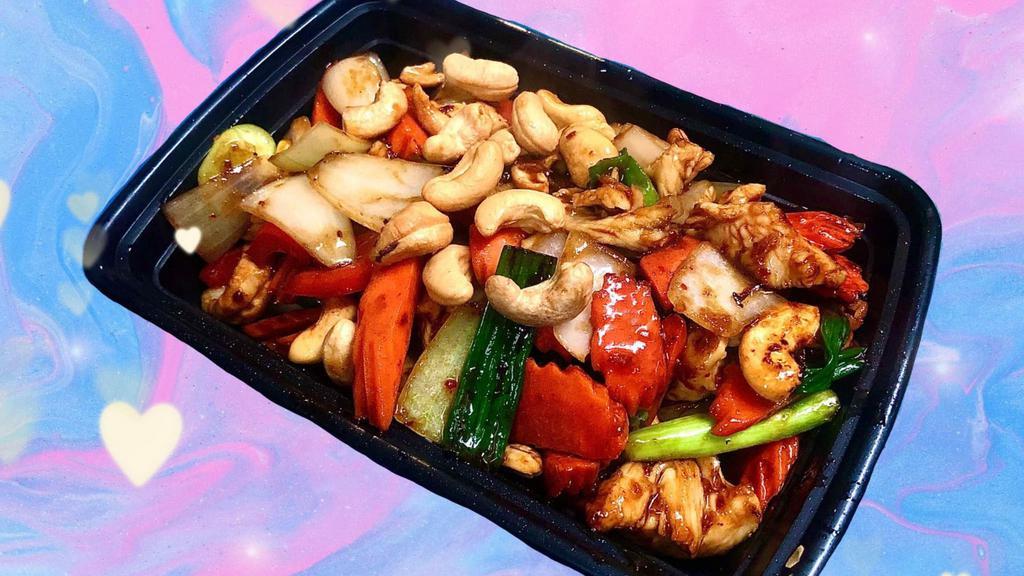 Pad Cashew · Stir-fried choice of meat with chili paste, bell peppers, carrot, cashew nuts, onions, and green onion.