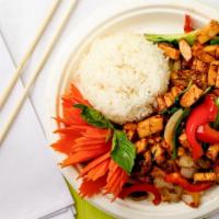 Pad Kra Prow · Chili, garlic, bell peppers, onions, mushrooms, green onions, and basil leaves. Served with ...