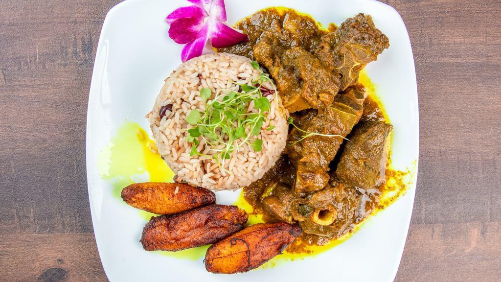 Curried Goat · With rice or roti, and a side of either potato salad, plantains, mashed potato or mac & cheese.