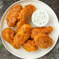 Vegan It Takes Two To Mango Habanero Wings · Vegan chicken wings breaded, fried until golden brown, and tossed in mango habanero sauce. S...
