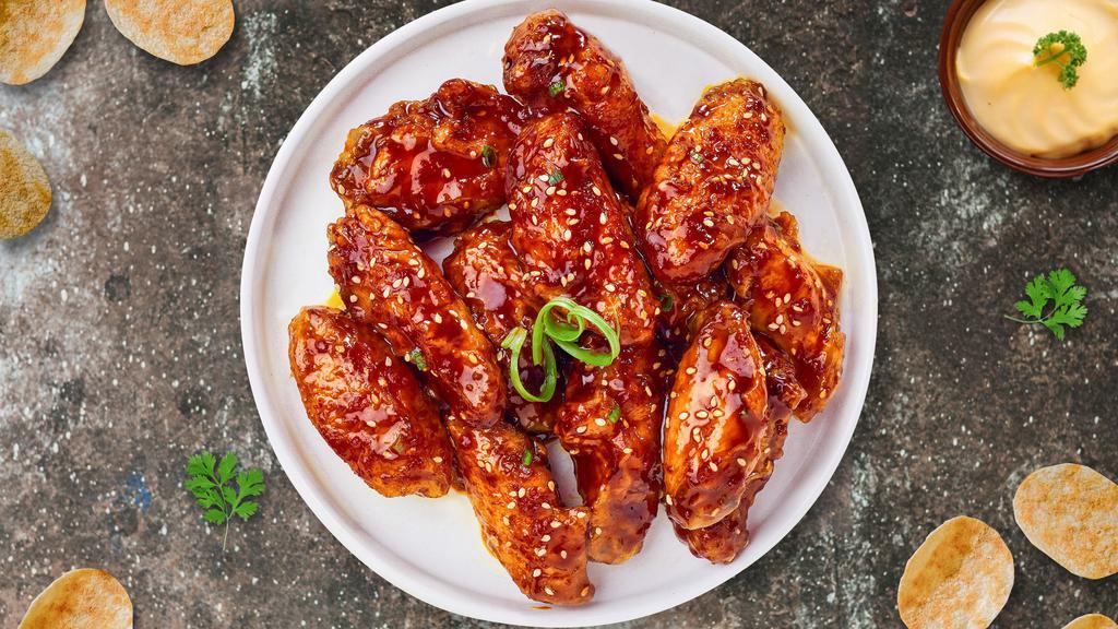 Vegan Seoul'S Wings · Vegan chicken wings breaded, fried until golden brown, and tossed in soy sauce, brown sugar, honey, and sesame seeds.
