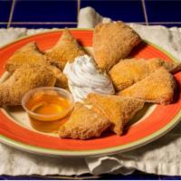 Sopapillas · 8 sopapillas served with your choice of dipping sauces.