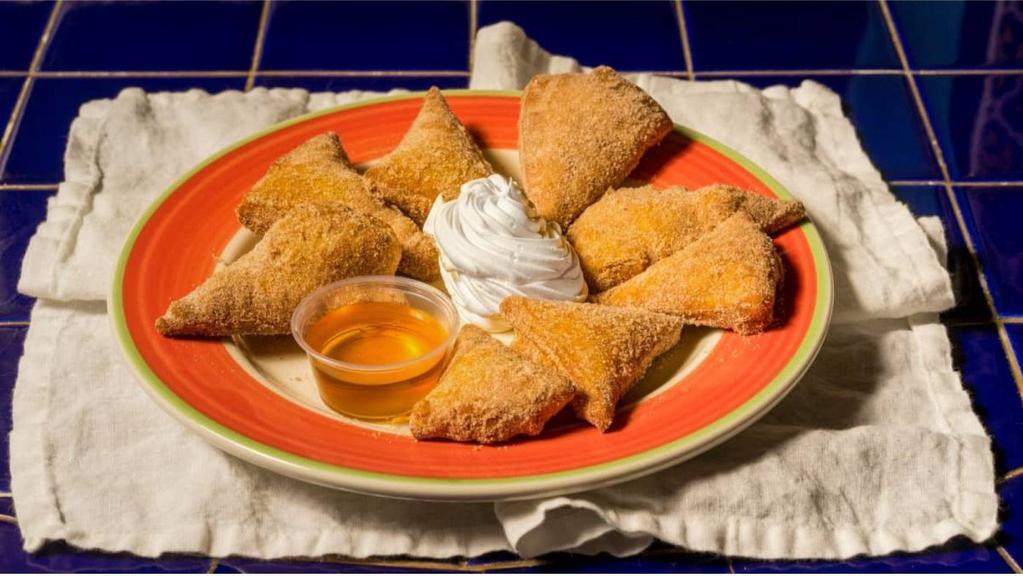 Sopapillas · 8 sopapillas served with your choice of dipping sauces.