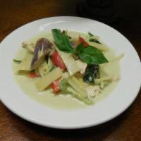 Green Curry · Sliced bamboo shoot, eggplant, mushrooms, bell pepper, green beans, and Thai basil cooked in...