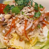 Yum Woon Sen · Steamed prawns and coarse chicken breast tossed with bean threads noodles, red onion, cilant...