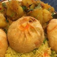 Shambala Vegetarian Plate · Spicy potatoes, vegetable fried rice, and three veggie fried momo.