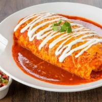 Burrito Mojado · Choice of meat, beans,rice, lettuce & cheese wrapped up in a flour tortilla, smothered in ou...