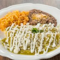 Enchiladas Verdes · Tortillas smothered in green sauce filled with choice of meat, topped off with queso fresco,...