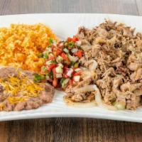 Carnitas Plate · Tender homemade carnitas sautéed with grilled onions served with rice, beans, pico de gallo,...