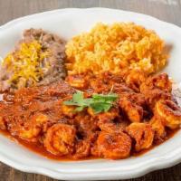 Camarones Enchipotlados · Sautéed shrimp smother in our chipotle sauce served rice, beans and tortillas (tortilla choi...