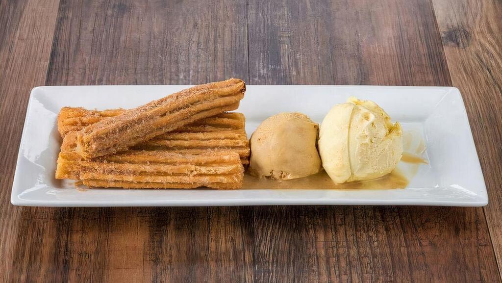 Churros · Churros filled with caramel served with one scoop of ice cream. If ice cream flavor is not chosen, it will be sub for extra 2 extra churros.