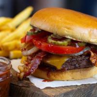Smokehouse Burger · Smoked bacon, cheddar cheese, honey BBQ sauce, tomato, pickles, and crispy onion straws. 113...