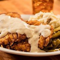 Chicken Fried Chicken · Boneless chicken breast (two) fried served with mashed potatoes, gravy, corn, and Texas toas...