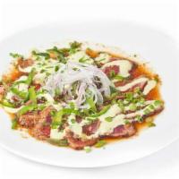 10 Spice Tuna Tataki · Seared Ahi, garlic ponzu, cilantro aioli, jalapeno, onion
