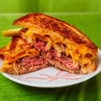 Patty Melt · House-ground beef burger with swiss cheese, caramelized onions served on toasted bread.